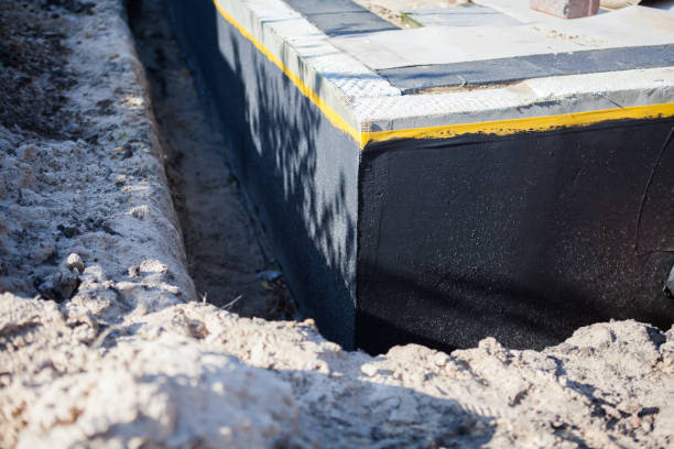Professional Exterior Waterproofing technician working in Williamsburg, OH